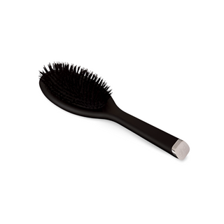 La brosse de la commode