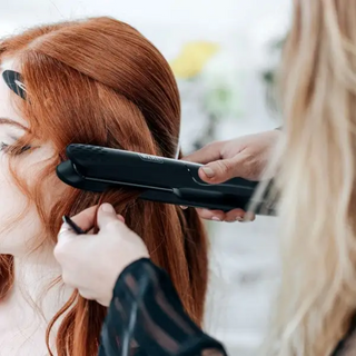 Lisseur Wahl Pro Glide en coiffage au salon